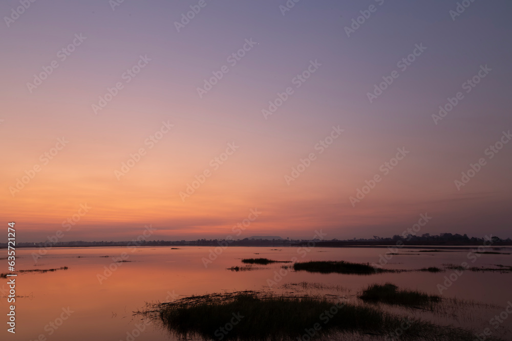 Landscape of beautuful sunrise in the morning with water reflaction.