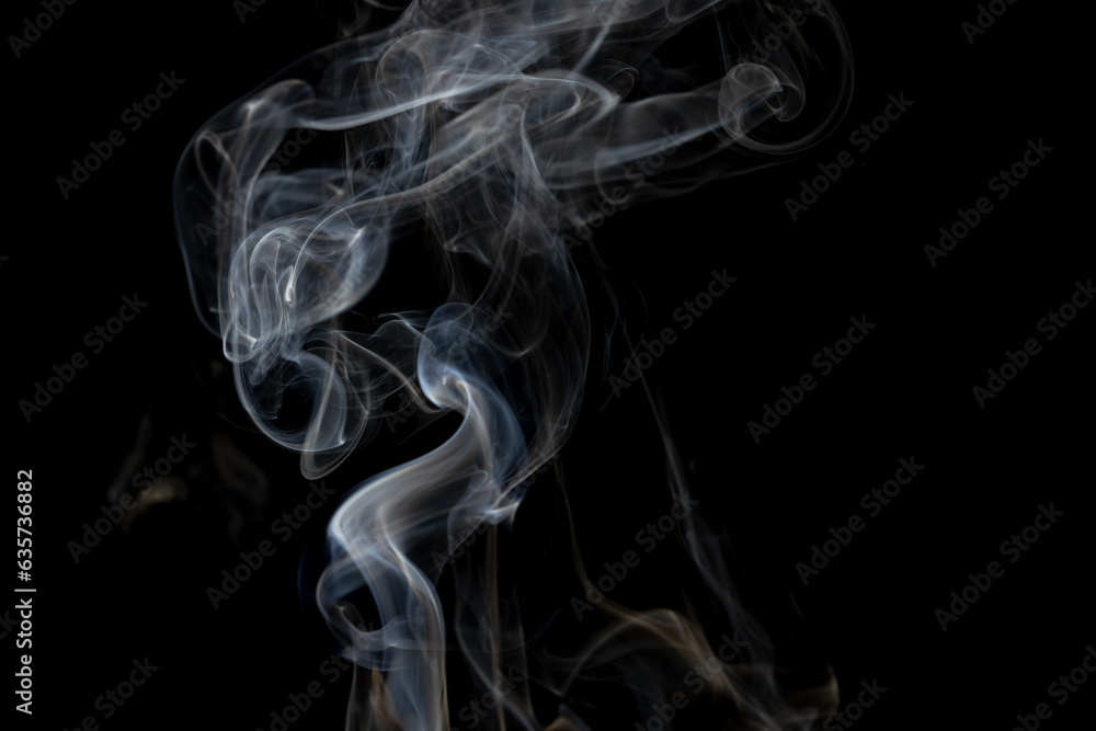 White clouds of smoke with copy space on black background White clouds of smoke with copy space on black background