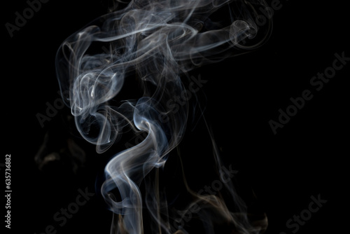 White clouds of smoke with copy space on black background