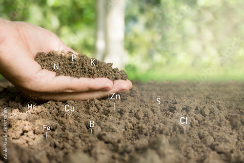 Soil quality monitoring for soil quality control The concept of smart farm agricultural economic development. And there are technology icons about the composition of the soil around it.