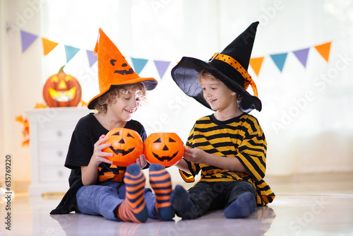 Kids in witch costume on Halloween trick or treat