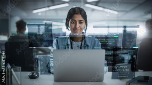 Young Indian Female Software Developer Working in Technological Start-Up Office. South Asian Specialist Programming Monitoring Solutions. VFX Hologram Edit Visualizing Coding Interface, Opened Windows