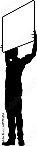 Protestor or demonstrator at a demonstration march, picket line or strike protest rally in silhouette. Holding up a banner or picket sign board placard.