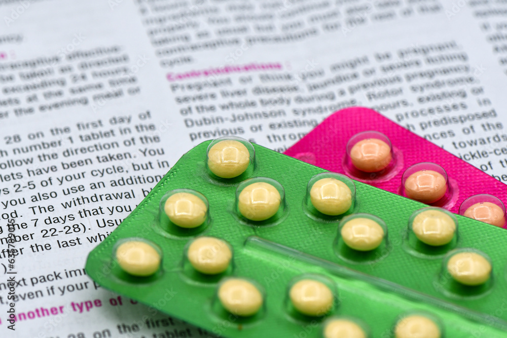 Oral contraceptive pill and patient education sheet. foto de Stock