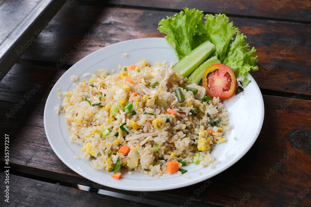 Top view of oriental fried rice on a white plate Top view of oriental fried rice on a white plate