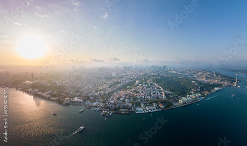 Istanbul panorama photo, Turkey. Istanbul Canal, as well as Bosphoros canal. Sunset time. Cityscape in Background. Drone Point of View.