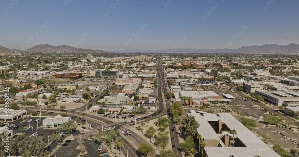 Scottsdale Arizona Aerial v13 cinematic drone fly straight above North Scottsdale road capturing downtown cityscape with low street traffics during daytime - Shot with Mavic 3 Cine - February 2022 Scottsdale Arizona Aerial v13 cinematic drone fly straight above North Scottsdale road capturing downtown cityscape with low street traffics during daytime - Shot with Mavic 3 Cine - February 2022