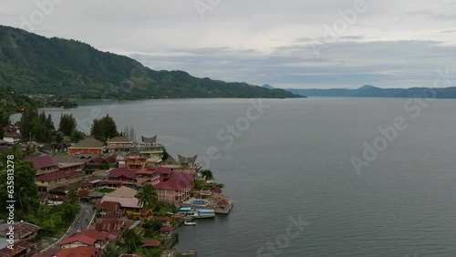 Town known as Tuk-Tuk, located in Samosir Island, Danau Toba Indonesia.Tropical landscape in Sumatra . photo
