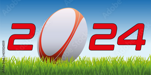 L’année 2024 avec un ballon de rugby posé sur la pelouse d’un terrain pour symboliser le lancement de la nouvelle saison de compétition. 