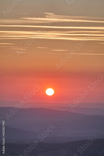 Fototapeta Naklejka Na Ścianę i Meble -  The panoramic views from the viewpoint of Las Palomas, in the Sierra de Cazorla, Segura and Las Villas, of the olive groves with the sunset. Jaen. Andalusia. Spain.