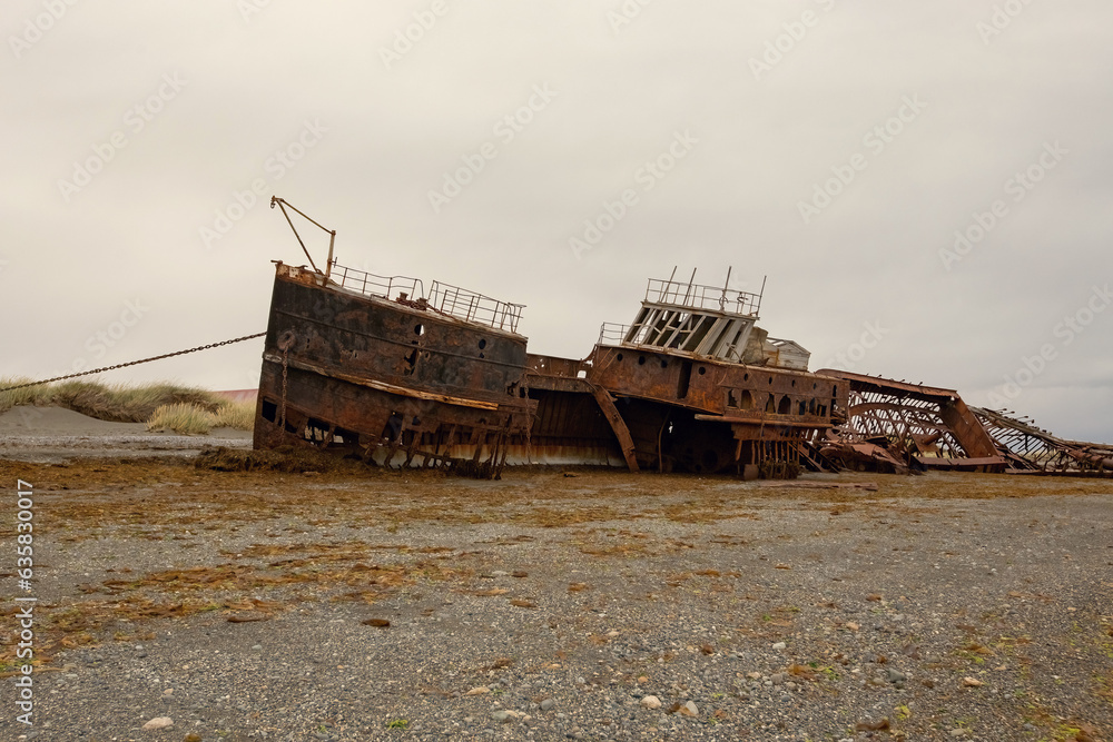 Shipwreck called Amadeo on the  coast of Magellan Strait, rusty warship wreck, Tierra Del Fuego, Chile