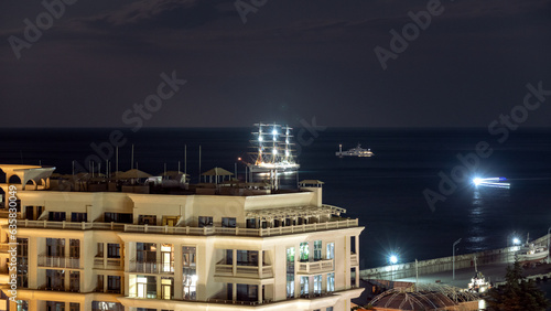 View of the Yalta Bay at night from the embankment in the Crimea