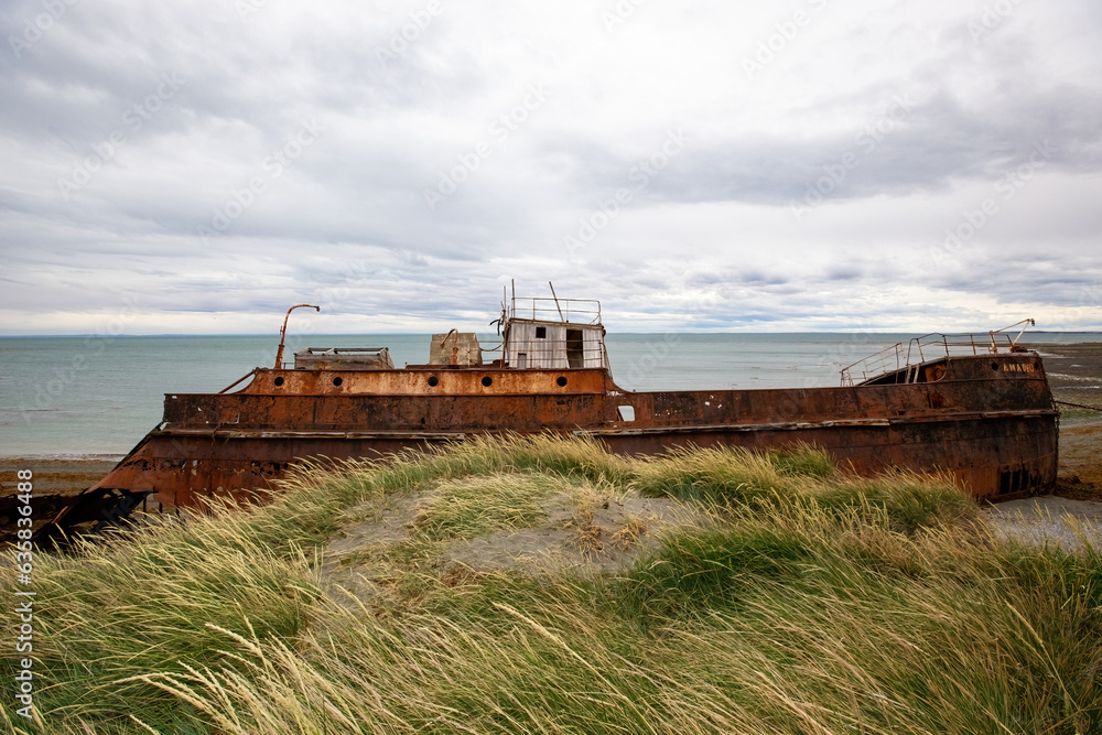 Shipwreck called Amadeo on the coast of Magellan Strait, rusty warship wreck, Tierra Del Fuego, Chile Shipwreck called Amadeo on the coast of Magellan Strait, rusty warship wreck, Tierra Del Fuego, Chile