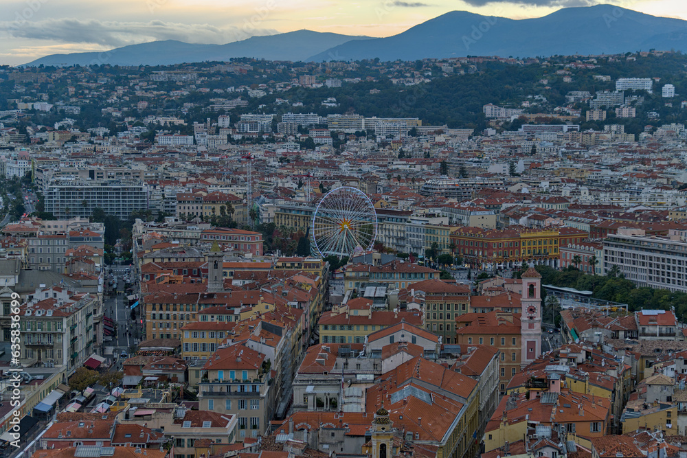 View on ferris wheel in center of Nice, France in the evening