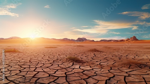 Fractured Earth: A Panorama of Dry and Cracked Desert. A Conceptual Image of Scarcity, Drought, and Climate Change in the Age of Global Warming