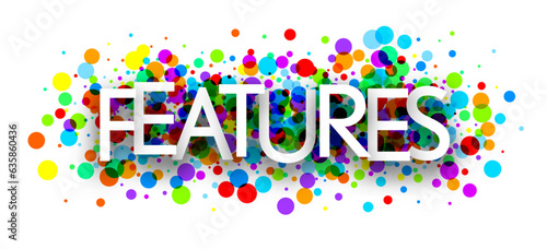 Features sign over colorful round dots confetti background.