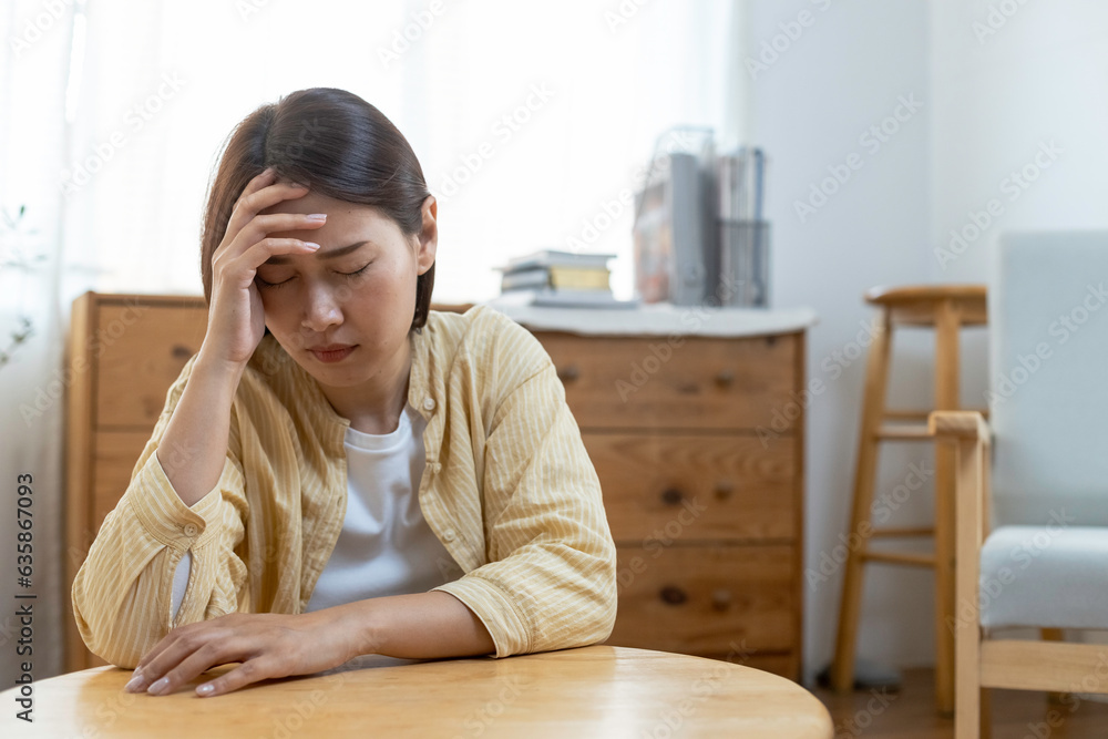 woman hand touching head have headache, young asian female stressed from hard work, life problems tired discouraged, disappointed in love, Girl suffering depression and alone. woman hand touching head have headache, young asian female stressed from hard work, life problems tired discouraged, disappointed in love, Girl suffering depression and alone.