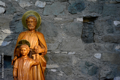 ctolica wooden sculpture of jesus or san pedro or san francisco de asis photo