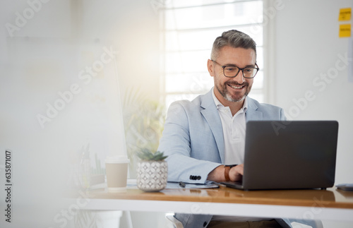 Happy business man typing on laptop for email update, online project and reading digital report with mockup space. Mature manager, entrepreneur and working on computer for research, planning and info photo