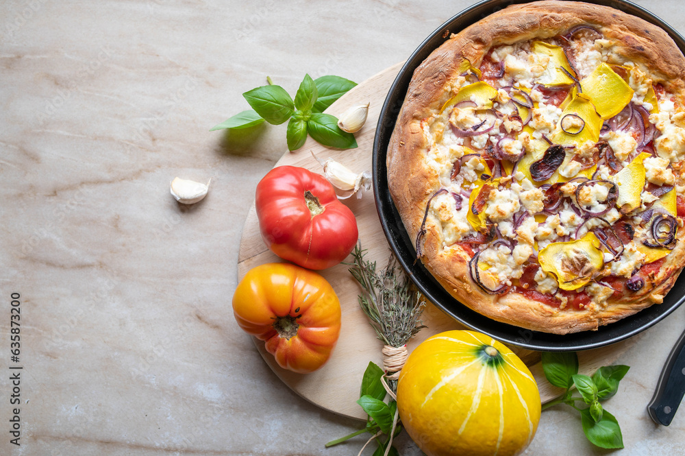 Zero waste meal with homemade pizza. Topped with fresh garden vegetables, feta cheese and spanish salami. Zero waste meal with homemade pizza. Topped with fresh garden vegetables, feta cheese and spanish salami.