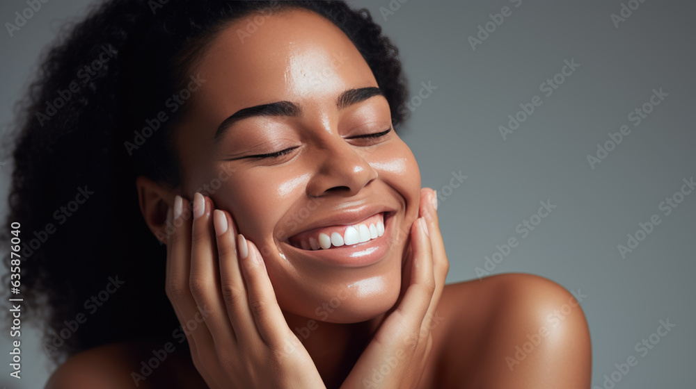 Close up beauty portrait of a laughing beautiful half naked woman applying face cream isolated over grey background. Created with Generative AI technology. Close up beauty portrait of a laughing beautiful half naked woman applying face cream isolated over grey background. Created with Generative AI technology.