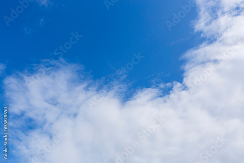 White clouds on blue sky  weather concept