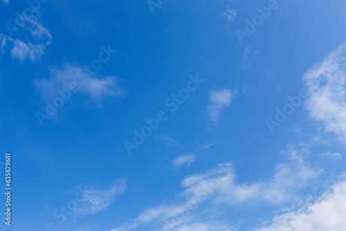 White clouds on blue sky, weather concept