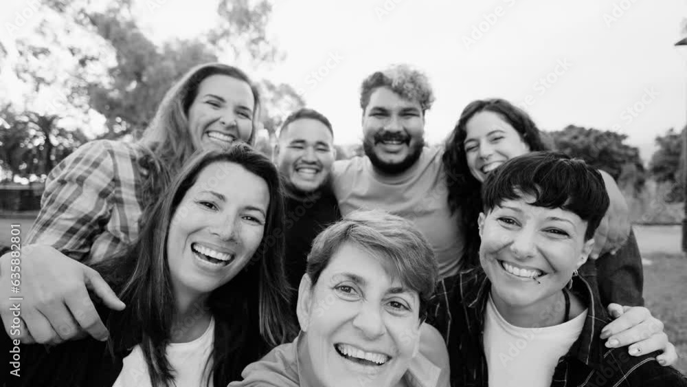 Multicultural people having fun together at park city - Happy group of friends taking selfie picture outdoors - Friendship and international community concept - Black and white editing Multicultural people having fun together at park city - Happy group of friends taking selfie picture outdoors - Friendship and international community concept - Black and white editing