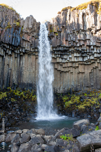 Svartifoss is a thin, 20m-high waterfall tumbling down the center of a dramatic 3D wall of hexagonal basalt columns.
