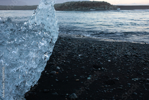 Diamond Beach is a striking black-sand beach famed for the huge, glistening iceberg fragments drifting ashore.