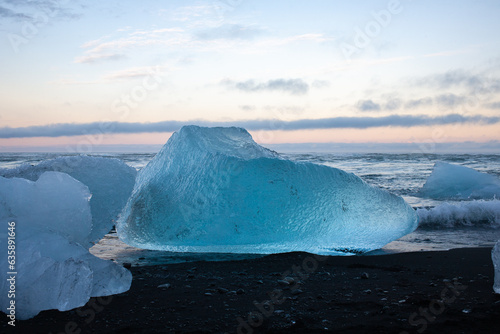Diamond Beach is a striking black-sand beach famed for the huge, glistening iceberg fragments drifting ashore.