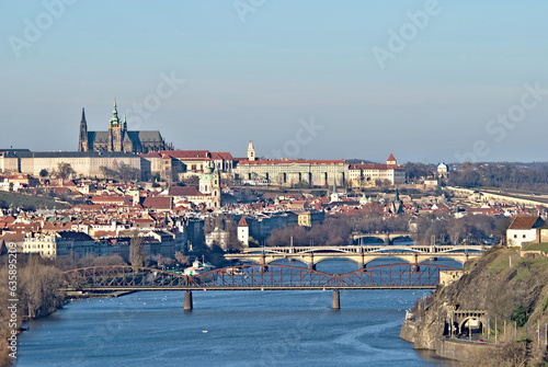 Town centre view in Prague with Prague castle. Czech republic capital city full of ancient architecture, bridges, culture, street artists. photo