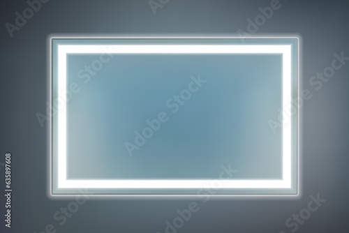 Rectangular mirror with built-in white LED illumination on the front surface against a dark background. Original piece of furniture with modern lighting