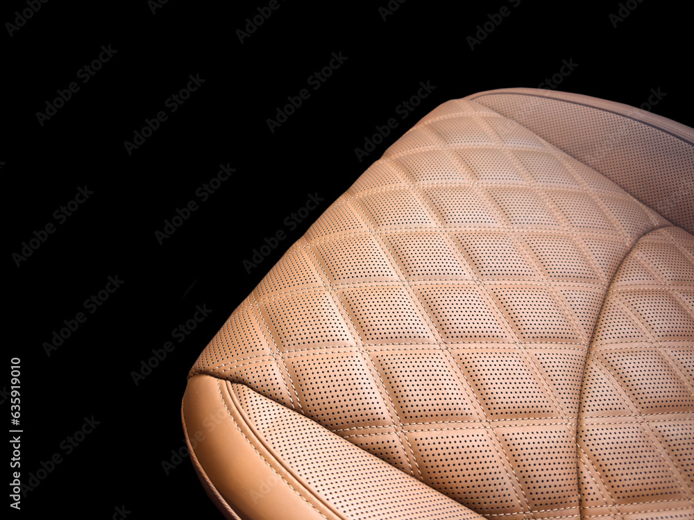 Modern luxury car brown leather interior. Part of orange leather car