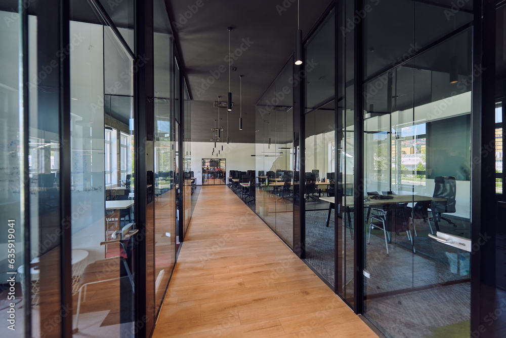 In a setting of modern, glass-walled business startup offices, the open, airy workspace reflects a contemporary and innovative ambiance, promising a dynamic environment for entrepreneurial growth In a setting of modern, glass-walled business startup offices, the open, airy workspace reflects a contemporary and innovative ambiance, promising a dynamic environment for entrepreneurial growth