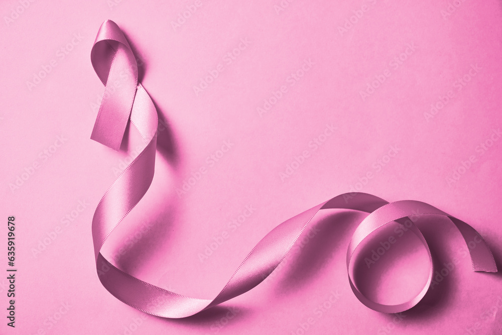Pink ribbon on pink flatlay, breast cancer concept, breast cancer awareness, breast cancer day, october. Pink ribbon on pink flatlay, breast cancer concept, breast cancer awareness, breast cancer day, october.