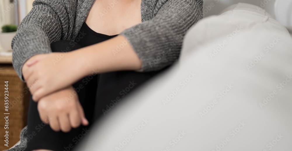 Sad Overweight plus size woman thinking about problems on sofa upset girl feeling lonely and sad from bad relationship or Depressed woman disorder mental health. Sad Overweight plus size woman thinking about problems on sofa upset girl feeling lonely and sad from bad relationship or Depressed woman disorder mental health.