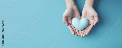 Hand holding blue heart, World health day, Health care and mental health concept, Health insurance, Charity volunteer donation, CSR responsibility, World heart day, Self love