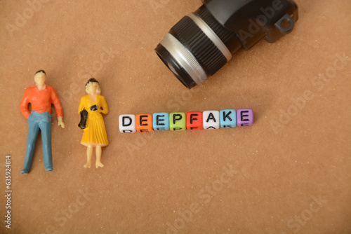 Fotografija Miniature people and camera with text DEEPFAKE