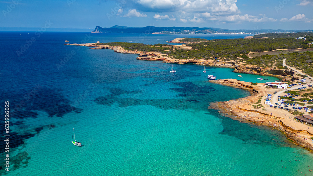 Aerial of Comte beach with its turquoise waters, Ibiza, Balearic Islands, Spain, Mediterranean Aerial of Comte beach with its turquoise waters, Ibiza, Balearic Islands, Spain, Mediterranean