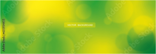Green Defocused Abstract Background with Colorful bright Gradient, Spots and highlight with Blurred shapes.