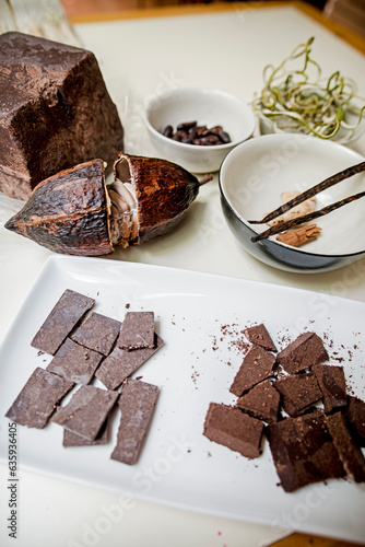 Chocolate processing in Modica, Sicily, Italy. Raw cacao pods and beans in a chocolate factory.