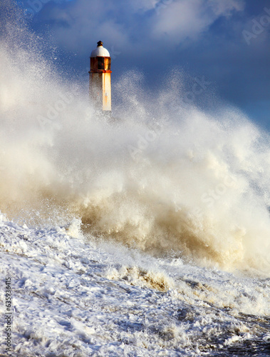 Storm waves over Porthcawl Pier, Porthcawl, South Wales, United Kingdom photo