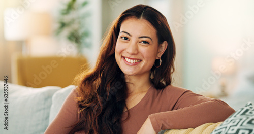 Fotografija Serious woman, relax and home with a beautiful asian female feeling calm, peaceful and enjoying her free time on the sofa at home