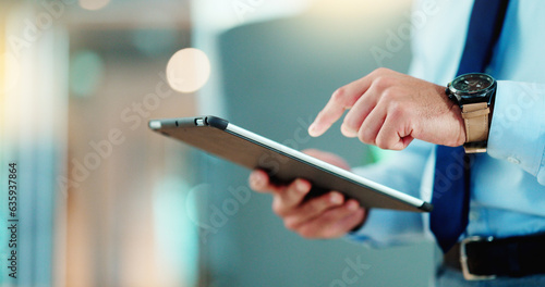 Business man browsing on a digital tablet in an office. Closeup on hands of a corporate professional and expert staying organized with apps. Scrolling on the internet and planning successful ideas