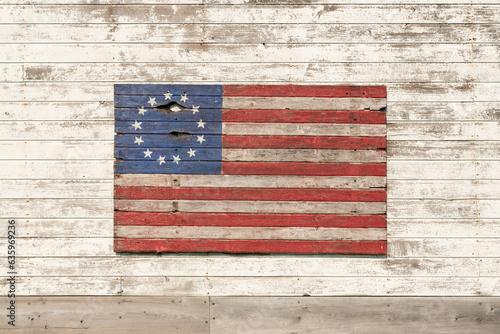 Painted wood Colonial American Flag. photo