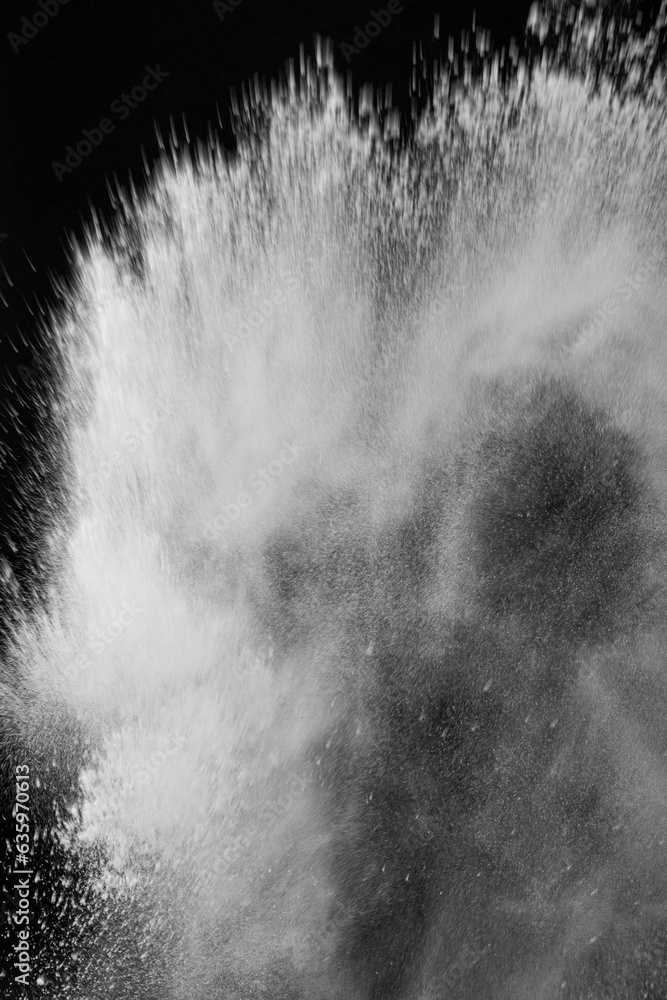 Fototapeta premium Dynamic black background with splashes of water, creating a unique and eye-catching composition