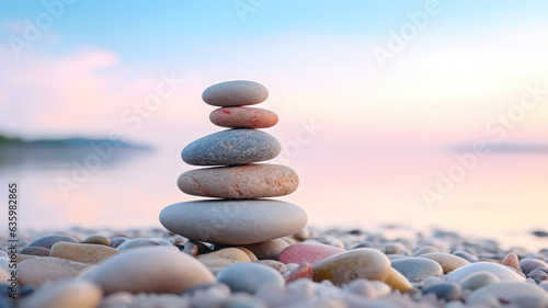 Zen stone tower with peaceful sea and sky bokeh