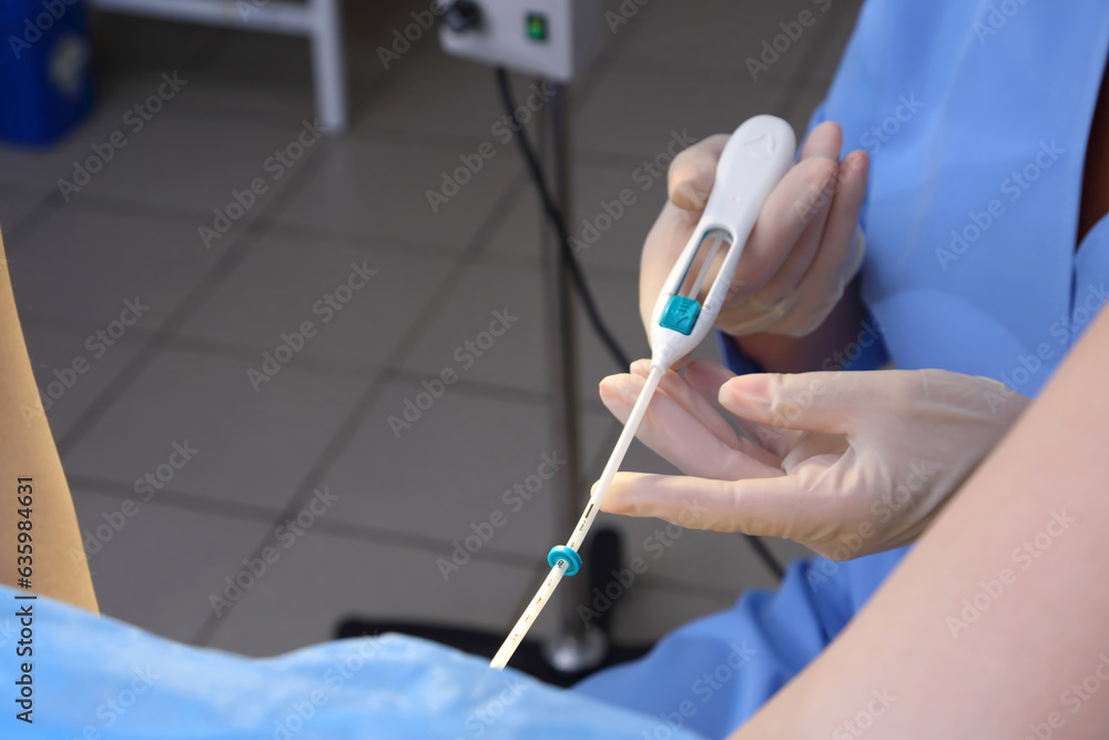 Contraceptive IUD. Installation of a birth control system. The