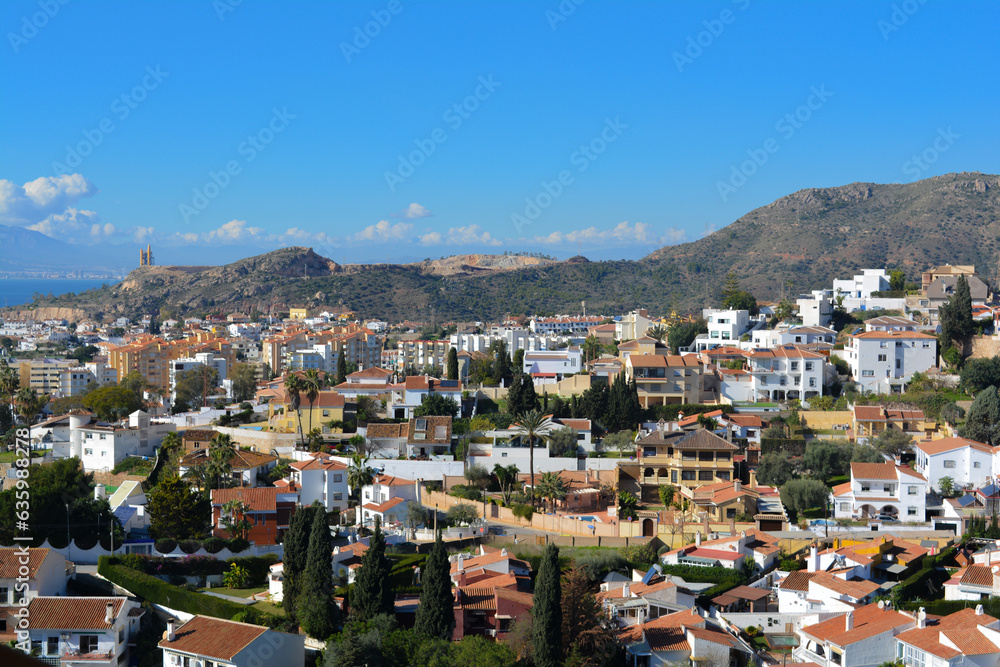 Panoramic view of Malaga, Andalusia, Spain. Beautiful white houses. Mountain on the horizon